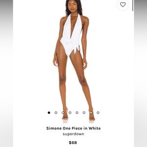 White Superdown one piece swimsuit. Never worn. Size small.